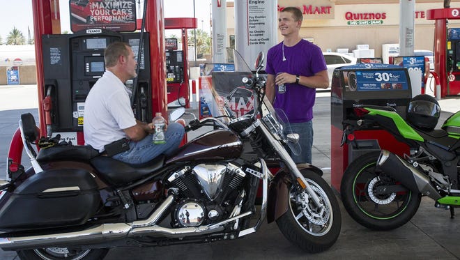 James Gothro (left) and his son Jacob Gothro (right) take a break at the Dateland Travel Center during their ride from San Diego to Surprise. Jacob is currently stationed in San Diego and was making his first motorcycle ride in the Arizona heat, so his father met him half way to complete the journey.