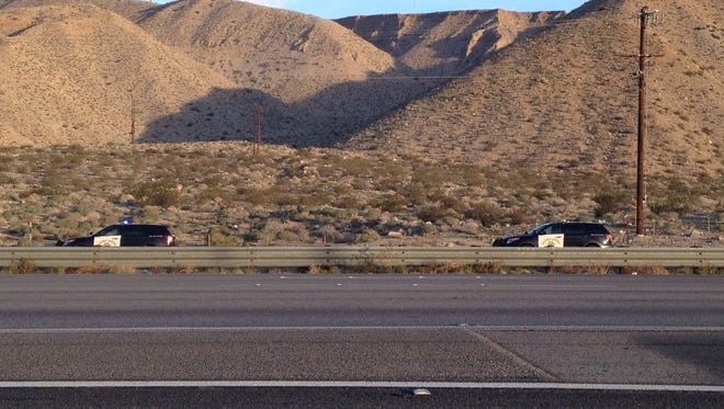 California Highway Patrol officers park along Interstate 10 where a crash occurred in Whitewater Wednesday.