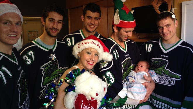 Dancer Melody Lynn participated with the Everblades in their annual teddy bear giveaway.