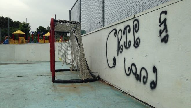 "Cripland" was painted on the walls of a hockey rink in North Park.