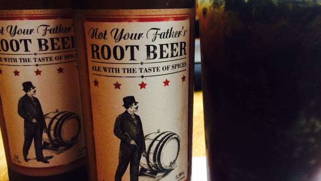 Not Your Father's Root Beer by Small Town Brewery in Wauconda, Ill., kicked off a rush for alcoholic root beer that's cleared shelves across metro Detroit. Shown here at Redsmoke Barbecue in downtown Detroit.