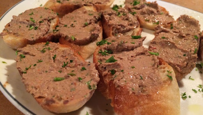 Ariani owner Dario Zuljani prides himself on his food, especially his liver dishes, including this thrown-together plate of his chicken-liver pate.