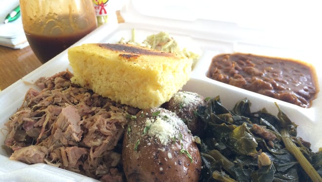 Eastern Carolina-style pork with red potatoes, collards, ranch beans, slaw and buttermilk cornbread from John's Good Food in east Fort Myers.
