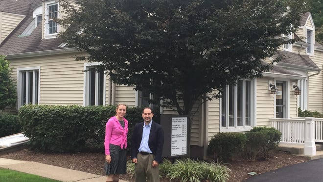 Erica Jedynak, New Jersey State Director of Americans for Prosperity Foundation, and Communications Director Michael Proto outside 550 West Main Street in Boonton, where the foundation will open a new community center.