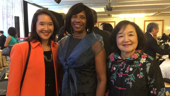 Attending the National Association of Asian Pacific American Bar Association Conference Gala on Nov 7 were (from left) Jenny R Yang, chairwoman of the U.S. Equal Employment Opportunity Commission who grew up in New Jersey; Paulette Brown, president of the American Bar Association who lives in Hillsborough; and Sue Pai Yang, retired judge of compensation from Bridgewater, who swore in the new NAPABA Board.