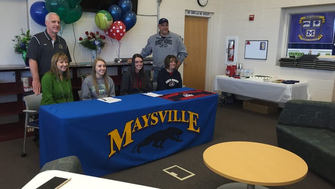 Maysville seniors Kori Sidwell and Madison Riggle signed their letters of intent Thursday at the high school. Pictured are (from top left: Lou Sidwell, Terri Sidwell, Kori Sidwell, Madison Riggle, Melissa Riggle and Kyle Riggle.