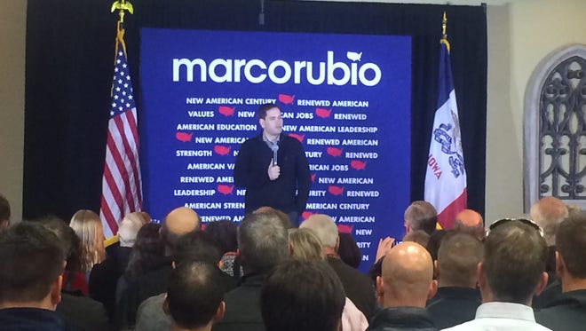 Republican presidential candidate Marco Rubio speaks to a group in Ankeny.