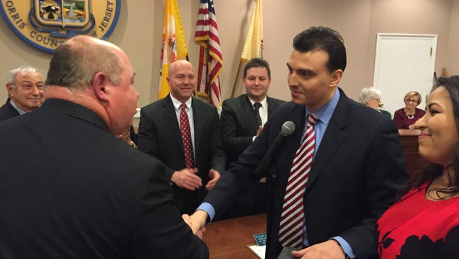 Parsippany Mayor James Barberio, left, swears in attorney Kaled Madin as the township's new acting clerk.