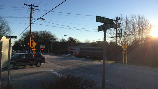 The view of traffic lights at  Bethel and East Butler Road from Old Mill Road in Mauldin. One part of the East Butler Road corridor plan calls for Old Mill to be realigned so that it connects to the intersection at Bethel.