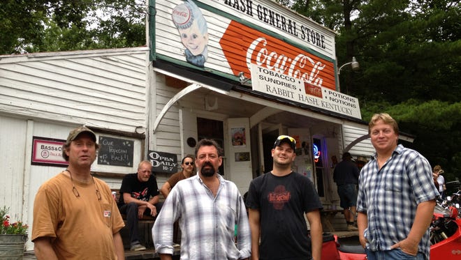 Rescuers of the teen motorists who drove into the Ohio River near Rabbit Hash General Store July 4th, 2013, were back together Friday night at the Boone County landmark. From left are Ken Steidle of East Bend, Lee Hartke of Rabbit Hash, Chris Frederick of Belleview Bottoms and Chris Fryman of Rabbit Hash.