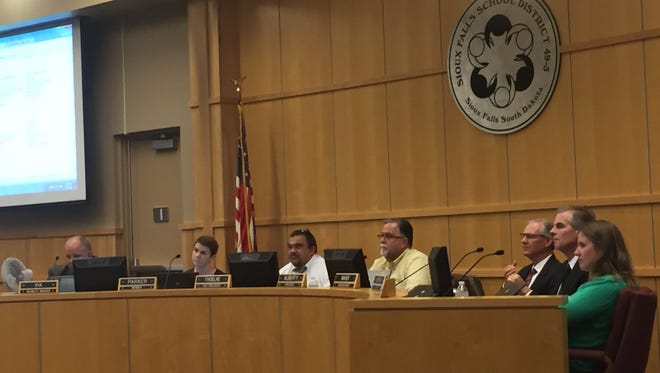 School board members approved the first reading of a new attendance policy on May 9, 2016.