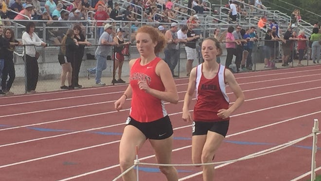 Pleasant senior middle distance runner Hannah Peltier, left, shown competing in the MOAC Track Championships two weeks ago, qualified for the regionals in three events.