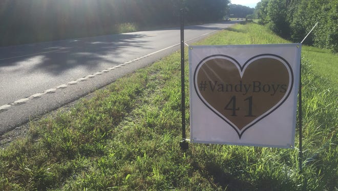 A sign in memory of Donnie Everett sits along side Ashland City Road in Clarksville on Tuesday. Everett who played baseball at Vanderbilt and Clarksville High drowned last Thursday.