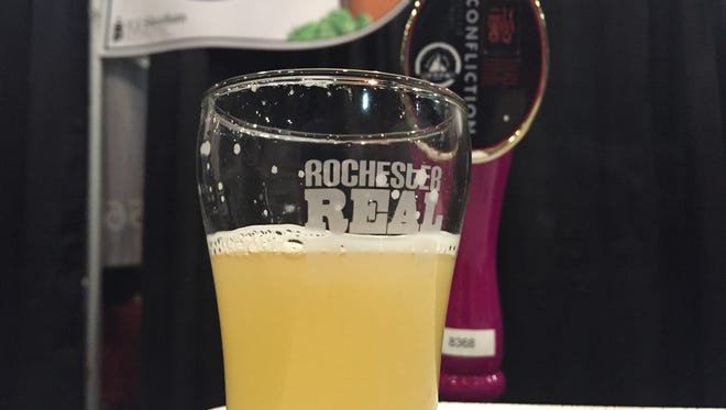 A pour of Sloop Confliction at Saturday's Rochester Real Beer Expo at the Blue Cross Arena.