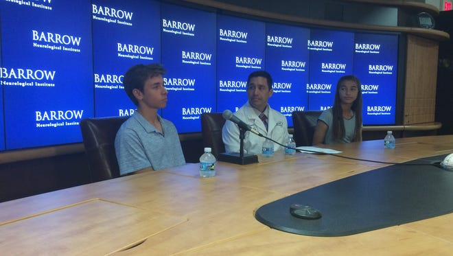 Andrew Wachtel and Bianca Feix discuss how concussions have impacted them at a news conference at Barrow Neurological Institute on Aug. 26, 2016.
