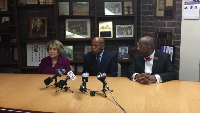 Rep. John Lewis, center, appeared in Rochester on Wednesday for a Get-Out-the-Vote Rally, sponsored by Rep. Louise Slaughter, left. The Rev. Kenneth James hosted the rally at Memorial AME Zion Church.