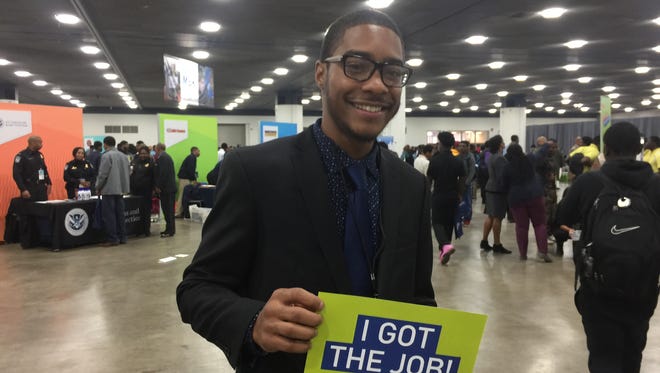 Donnevan Tolbert, 21, a Wayne State University theater student, landed a job at Applebee's during a Detroit career fair on Monday, Nov. 14, 2016, to help pay the bills while he considers pursuing a master's degree.