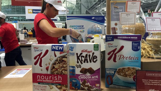 This Oct. 16, 2016, photo shows the Kellogg’s booth at an annual dietitians' conference, where company representatives explained the health benefits of their products, in Boston. The presence of major food companies underscored the conflict-of-interest issues in the nutrition field.
