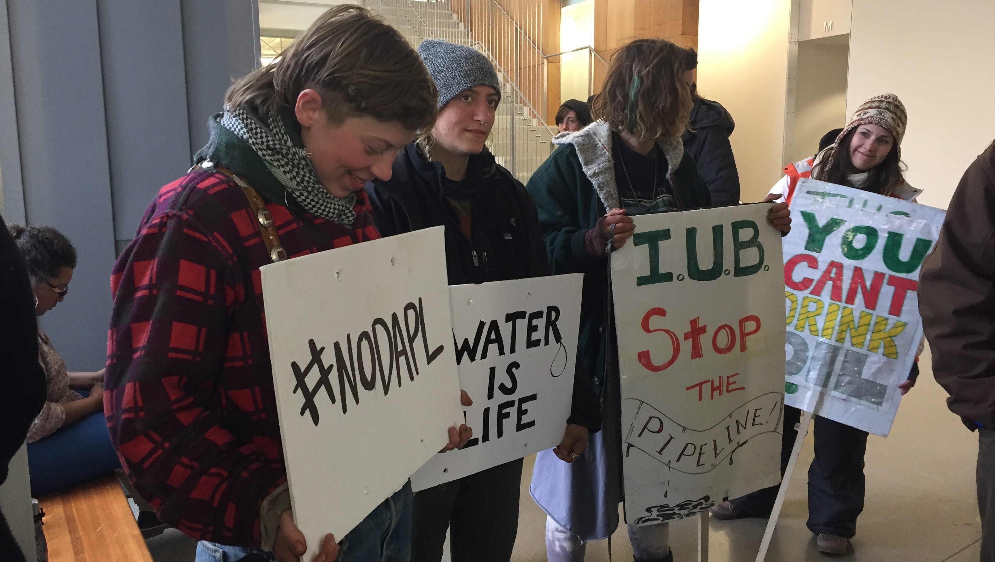 Two pipeline protesters arrested at Iowa Utilities Board