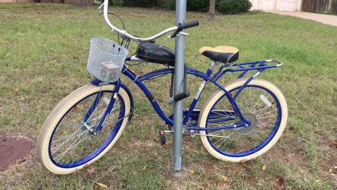 An abandoned bicycle is waiting for its owner at the corner of Sul Ross Street and A&M Avenue on Wednesday, Dec. 7.