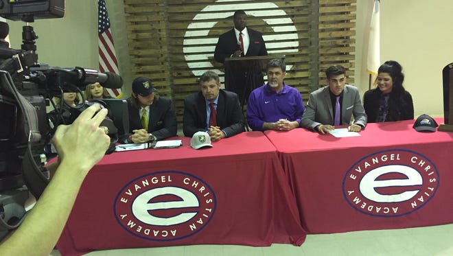 Evangel's Ethan Harvey (left) and Connor Cook signed letters of intent on Wednesday.