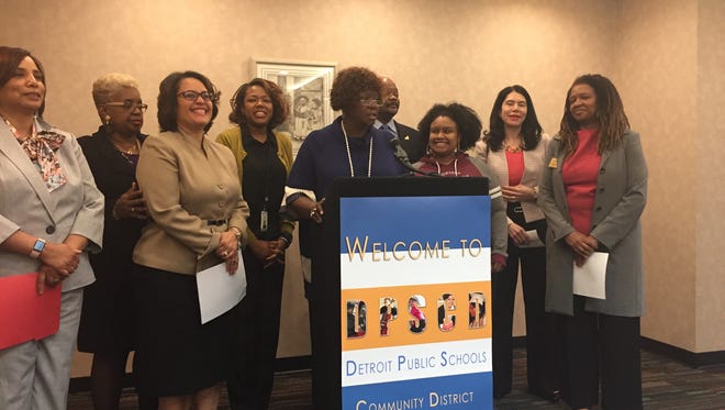 Members of the Detroit Public Schools Community District board of education, and officials with the district, Wayne RESA and Michigan Department of Education attend a news conference April 27.