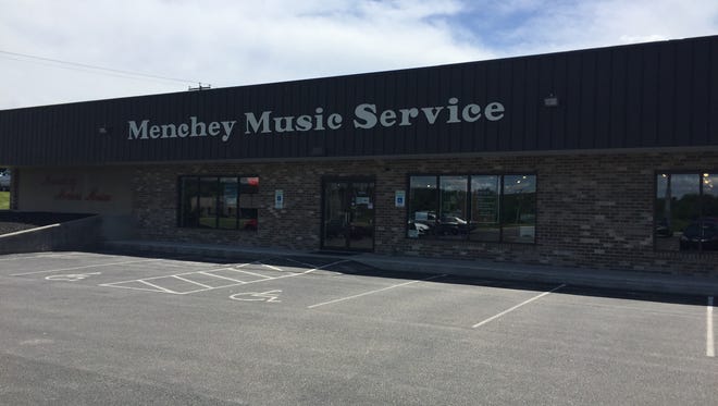 Menchey Music Service will place its building on Wetzel Drive for sale in anticipation of moving to a larger location in the Hanover area.