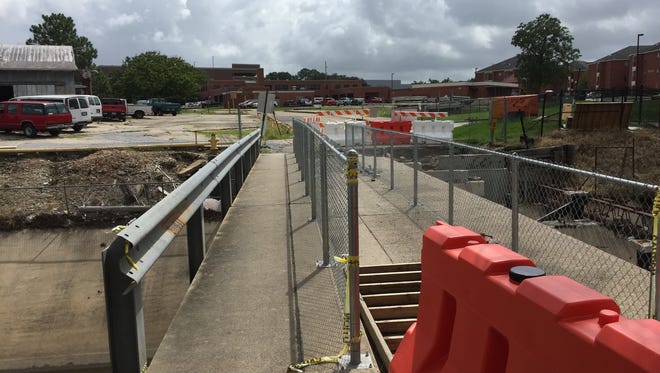 A pedestrian bridge connecting University Place Apartments and the University of Louisiana at Lafayette is slated to open July 1.