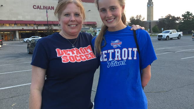 Maureen Louwers, left, with her daughter, Megan, after Detroit Mercy's 3-0 win over Eastern Michigan on Sunday, Sept. 17, 2017.