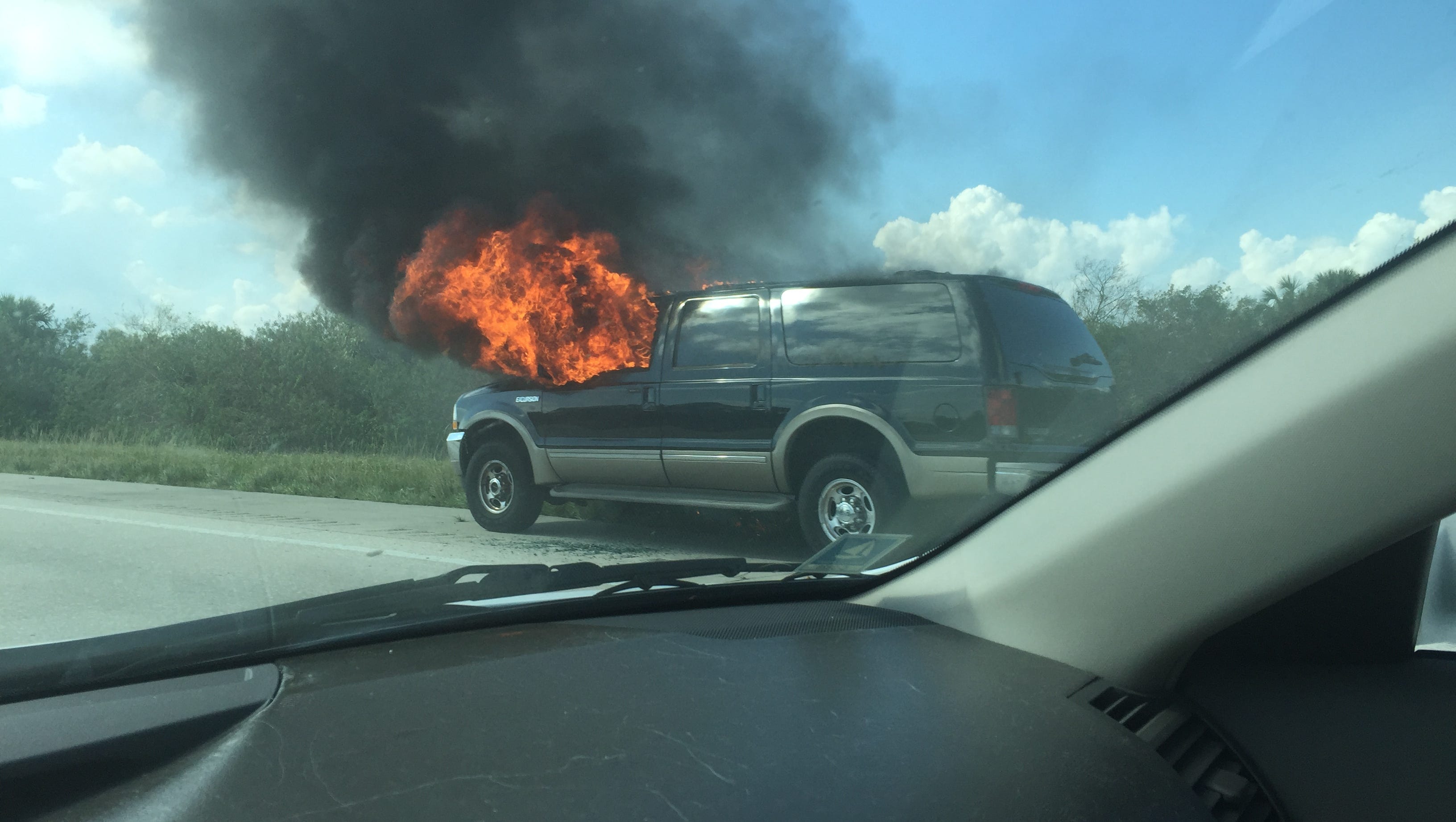 Burning car slows I-95 traffic in central Brevard