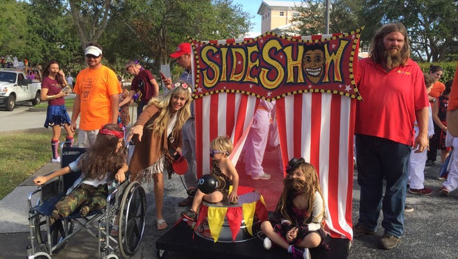 A family circus side show at the 2016 Halloween Parade.