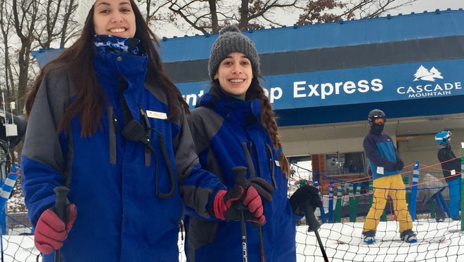 Ornella Martini Vivas (left) and Sophia Leones, both from Argentina, are two of the 45 South American students working at Cascade Mountain near Portage this winter.