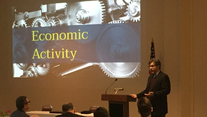 Ruben Hernandez-Murillo, economist with the Federal Reserve Bank in Cleveland, addresses the crowd Friday at the 2018 Economic Forecast Breakfast.