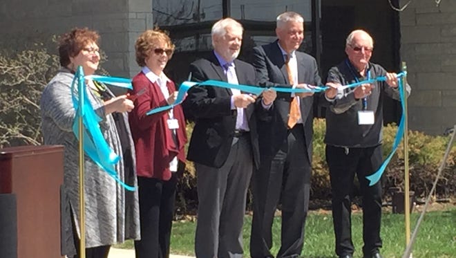 NWTC Regional Dean Jan Scoville, left, NWTC LIC Manager Liza Tetzloff, NWTC President Dr. Jeff Rafn, Nicolet National Bank Chairman and CEO Bob Atwell and Liberty Grove Village Chairman John Lowry participated in a ribbon cutting ceremony to open the new NWTC Sister Bay campus Monday, May 7, 2018.