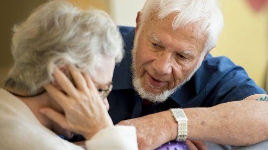 David Preston talks to his wife in the home for Alzheimer's patients where she lives. As Baby Boomers move into retirement age, chronic conditions from asthma to high blood pressure to cancer have become their biggest health problem.