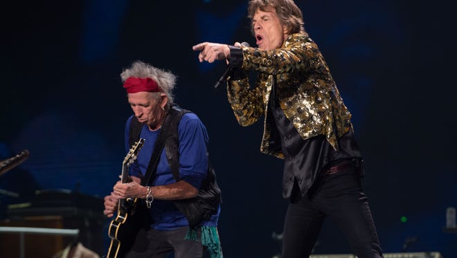 Keith Richards and Mick Jagger of the Rolling Stones perform in 2013 at the MGM Grand Garden Arena in Las Vegas.