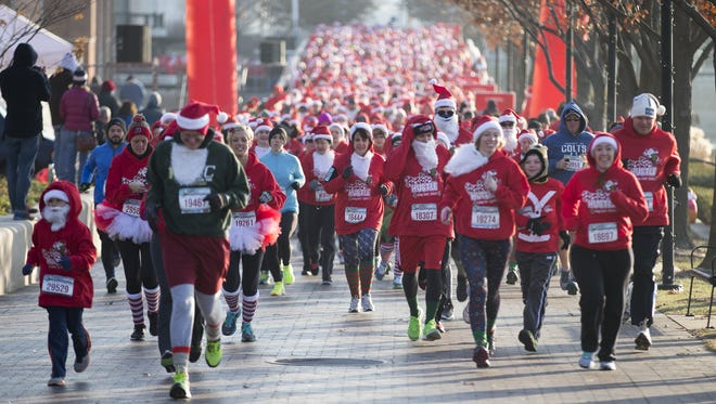 Racers take part in last year's Santa Hustle 5K and Half Marathon.
