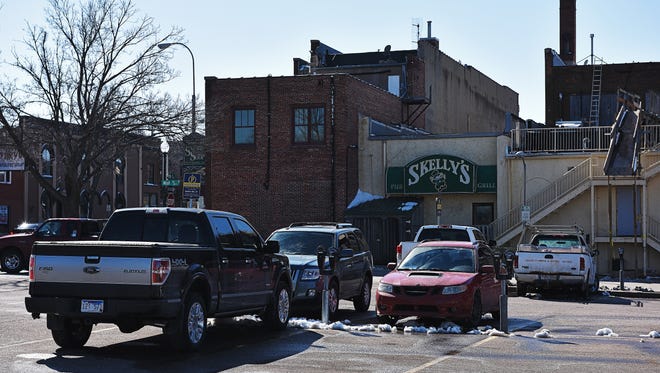 The parking lot along 10th Street behind Lucky's Thursday, March, 24, 2016, in downtown Sioux Falls. The location was supposed to be the site of a multi-million dollar mixed-use facility, but rising construction costs derailed the project. 