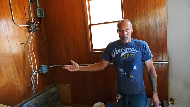 George Hamilton shows a property in the All Saints Neighborhood that he is renovating Friday, July 29, 2016, in Sioux Falls. 