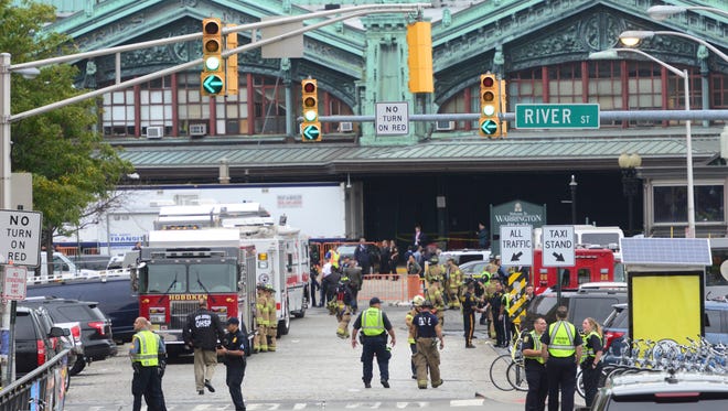 Emergency personnel respond to a train crash in the Hoboken train station in Hoboken in September.