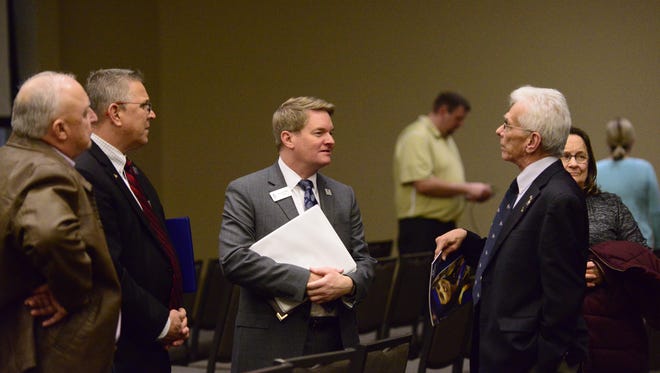 Terra State Community College President Jerome Webster, pictured center, talked about enrollment, student housing and the college's future Thursday at the annual "State of the College" address.