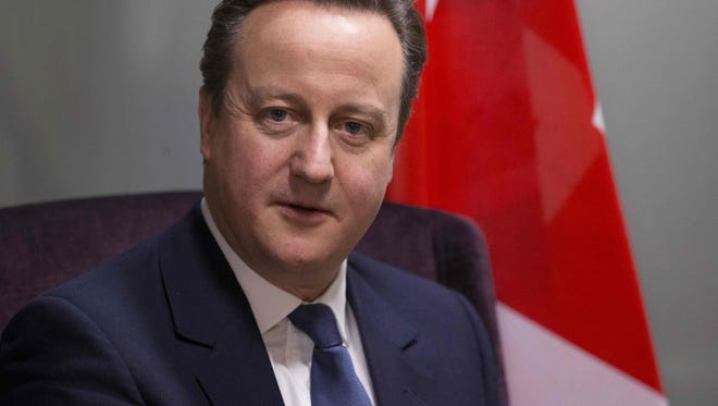 British Prime Minister David Cameron attends a meeting during a European leaders summit on Feb. 19, 2016, in Brussels.