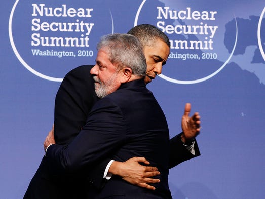 President Obama embraces Brazilian President Inacio