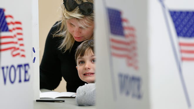 Brooke Unversaw brought her son Nathaniel, 5, to the United Church of Pittsford polling site during the NY primaries.