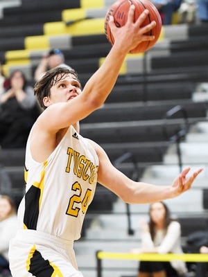 Tuscola's Lane Kervin shoots a layup in the Holiday Classic basketball game against Rosman December 29, 2017.