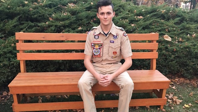 Connor Laughlin, an 11th grade Boy Scout and Eagle Scout candidate, built tables and seating outside the Shippensburg Public Library.