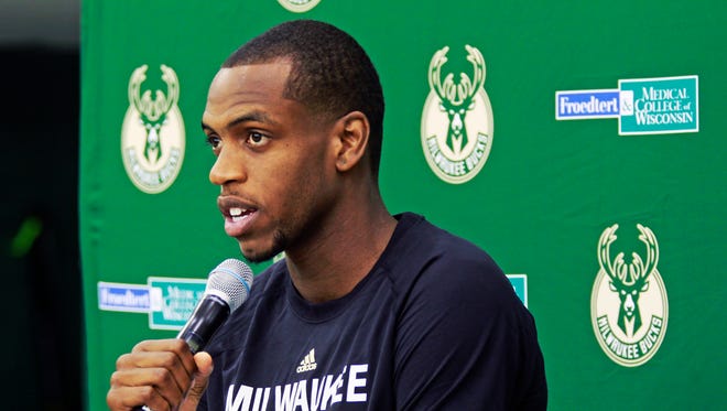 Khris Middleton talks about his injury during media day on Monday.