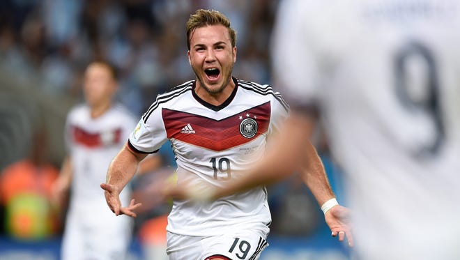 Germany midfielder Mario Gotze (19) celebrates scoring a goal in extra time against the Argentina in the championship match of the 2014 World Cup at Maracana Stadium.