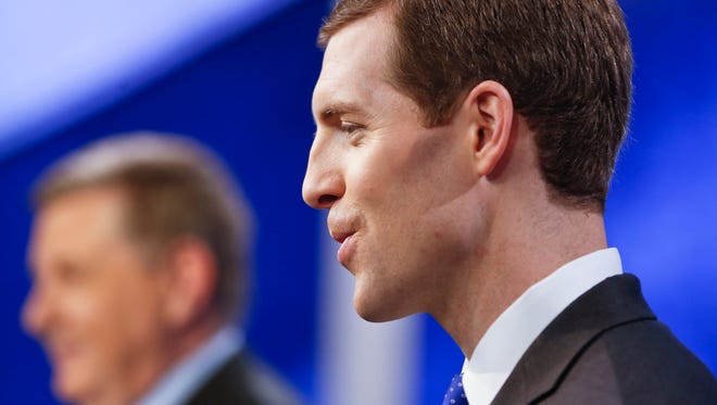 Democrat Connor Lamb, right, and Republican Rick Saccone speak before their first debate in the special election in the PA 18th Congressional District on Monday, Feb. 19, 2018, in Pittsburgh. Lamb’s apparent congressional upset in a GOP stronghold Tuesday suggests that Michigan Republicans’ recent election success will be tested.