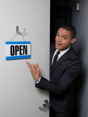 South African comedian Trevor Noah is all smiles in his offices at the 'The Daily Show With Trevor Noah' in New York.